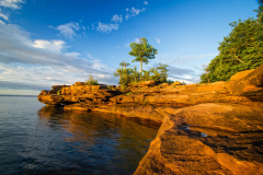 Sandstone shoreline at dawn